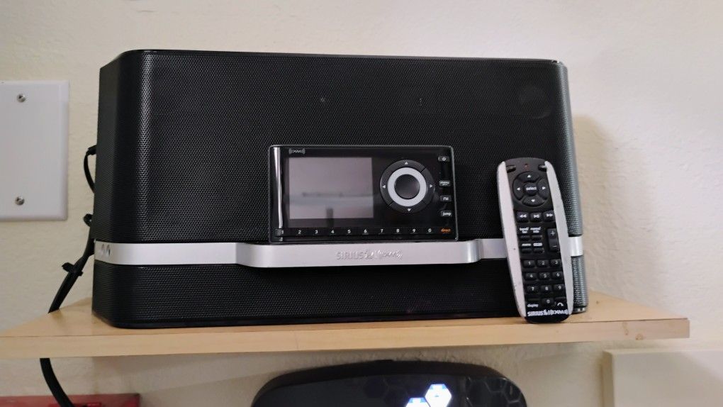 Sirius XM Radio SXABB1 Sirius/XM Portable Satellite Radio Receiver With Remote and XADV2 Dock &Play Vehicle Kit