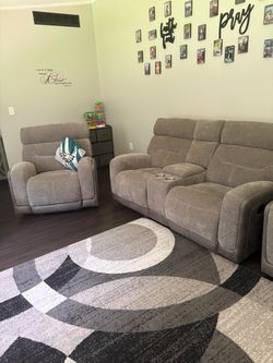 Gray Reclining Sofa and Recliner Set