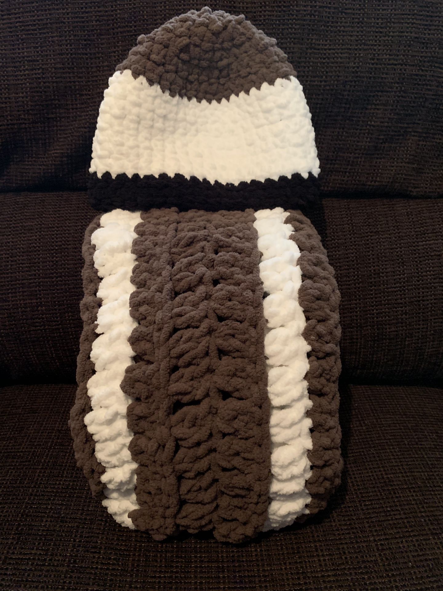 Football blanket/throw and matching hat.