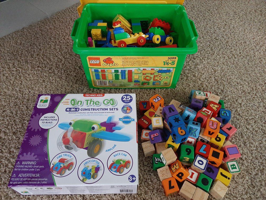 180 pieces Lego duplo. 
4in1 construction set. 
Wooden blocks with alphabet and numbers. 
