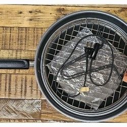 The Turbo Cooker 4-in-1
Cooking System, Steam,
Roast, Bake, and Fry!