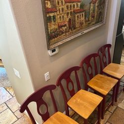 Four Counter height Chairs