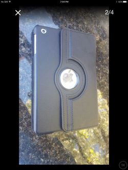 IPAD MINI LIKE NEW CODITION. CASES AND SCREEN PROTECTOR INCLUDED