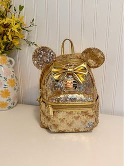 Disney Parks gold Loungefly backpack