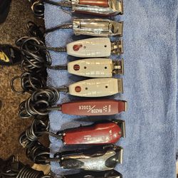 Assortment Of Professional Hair Clippers And Trimmers