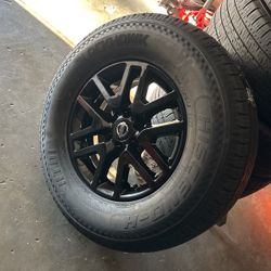 Rims&tires 16” Nissan Frontier Gloss Black Firm Price.  