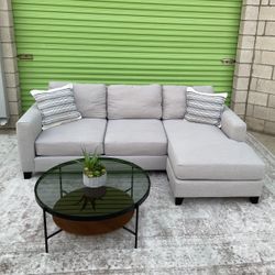 Gray Living Spaces Sectional w/ Reversible Chaise