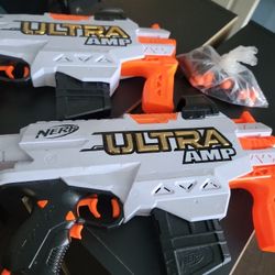 NERF PAIR OF ULTRA AMP PLAY GUNS W BULLETs