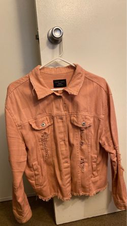 Light pink distressed jean jacket