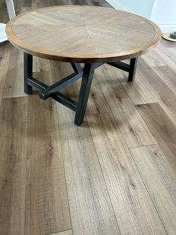 Round wood coffee table