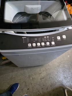 Portable Electric Black n Decker Washer & Dryer.