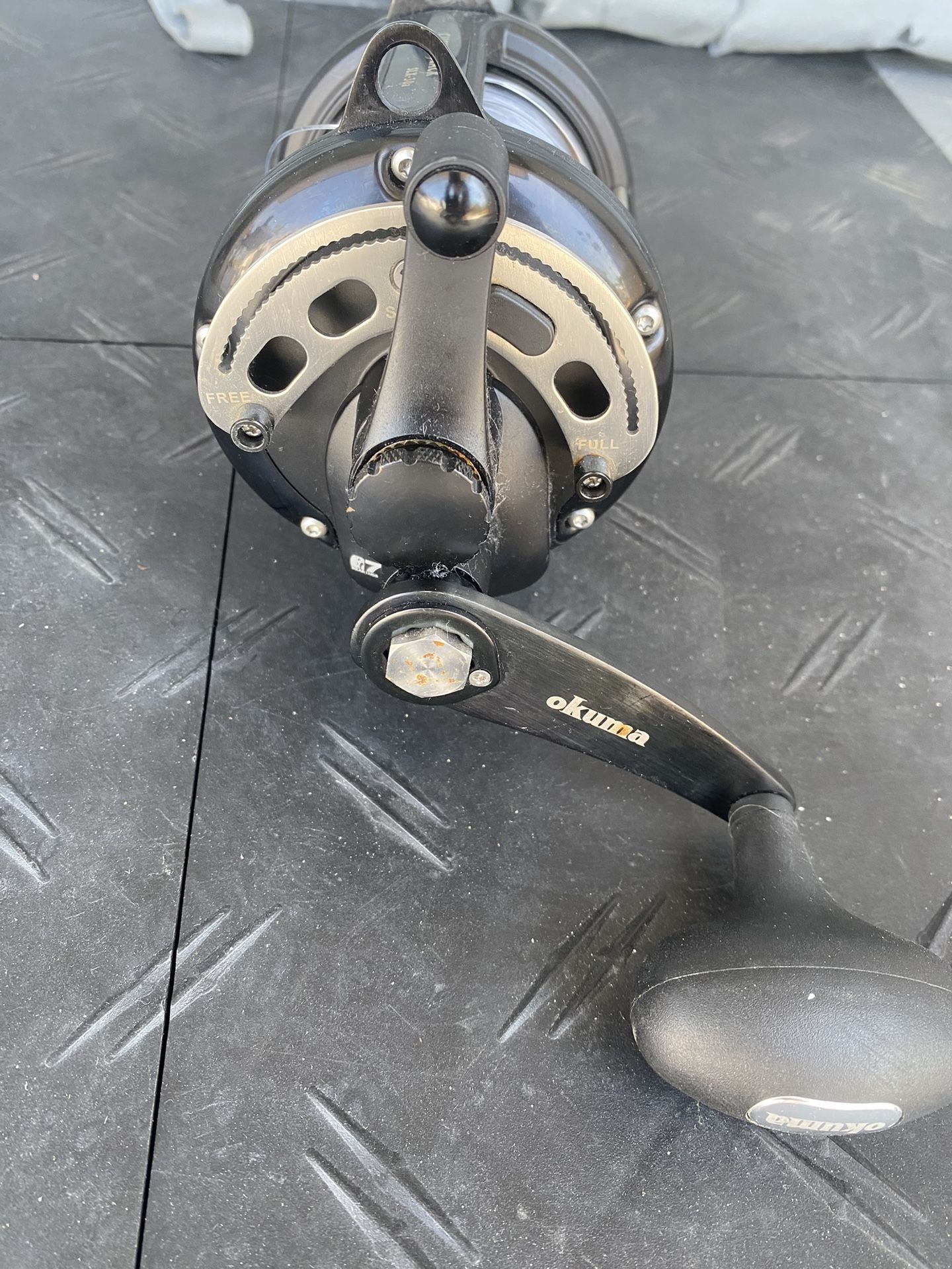 Okuma Custom Black SLX