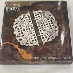Godinger 20th Century Baroque silver-plated expandable trivet. 9” And Expands To 11”