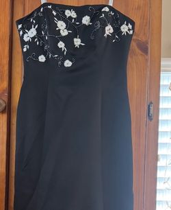 Davi’s bridal strapless black gown with white floral beading