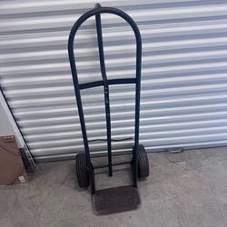 Solid, heavy duty, hand truck