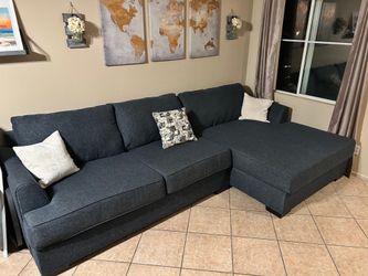 Beautiful Navy Blue sectional couch from Jerome’s