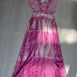 Long bohemian-style dress featuring a tie-dye pattern in shades of pink and white/$10