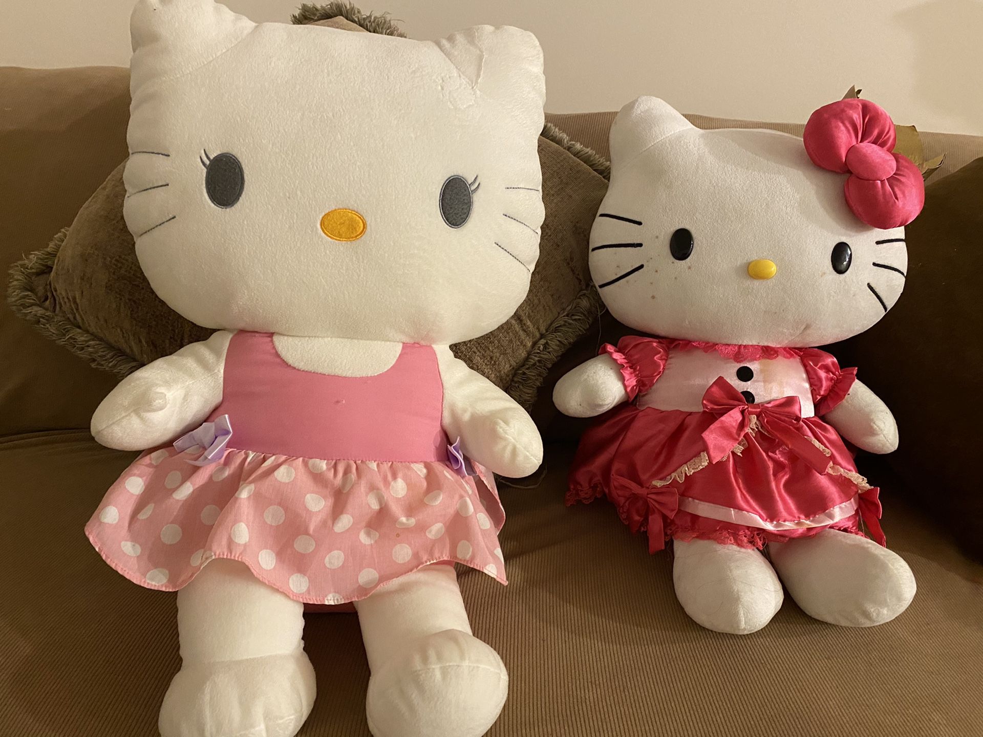 Two Big Hello Kitty Stuffed Animals