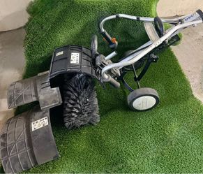 Sthil power broom frame with attachment for synthetic turf.