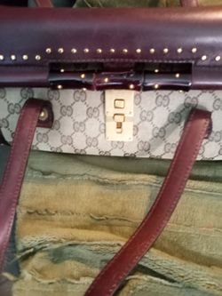 Gucci GG Monogram Handbag with Studded Trim