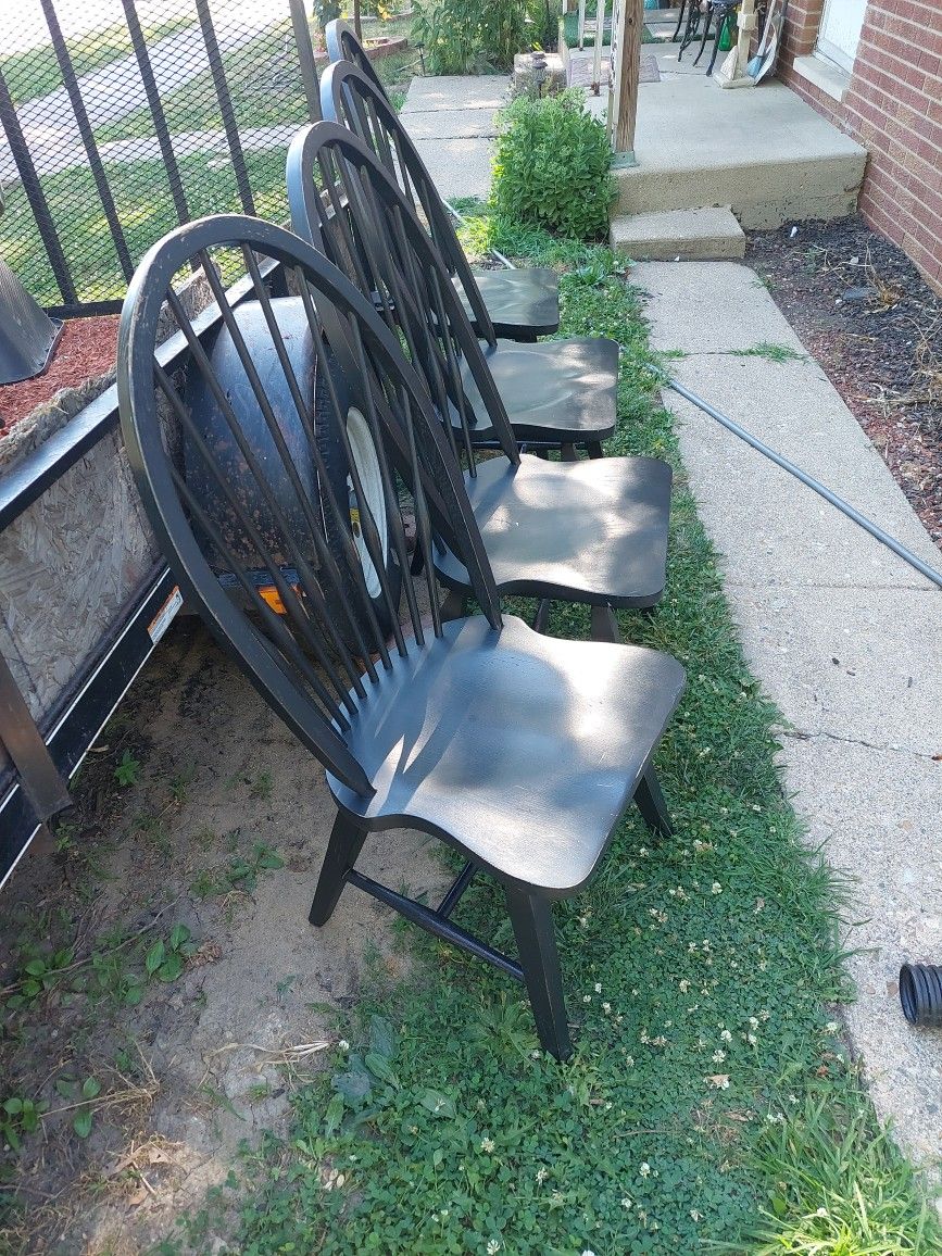 Nice Hard Wood Black Chairs.