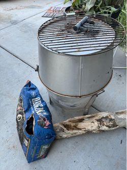 FREE grill or fire pit! With charcoal and fire wood!