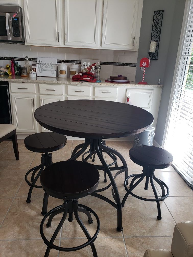 farmhouse breakfast table with adjustable height stools