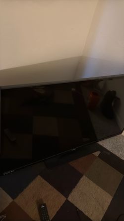 65 inch flatscreen TV with remote