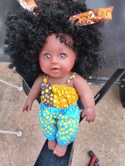 TsiTsi Dhori 13.78" Baby Dolls comes with 1 outfit w/ hair tie. Some assembly is required.