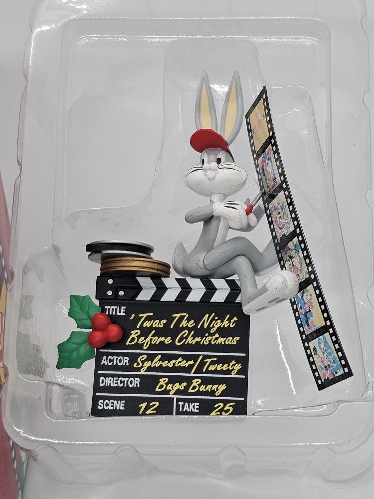 New Looney Tunes Bugs BUNNY Figure CHRISTMAS ORNAMENT movie Camera Film Matrix 

Vintage Looney Tunes Christmas Ornament, Bugs Bunny w/ Movie Equipmen