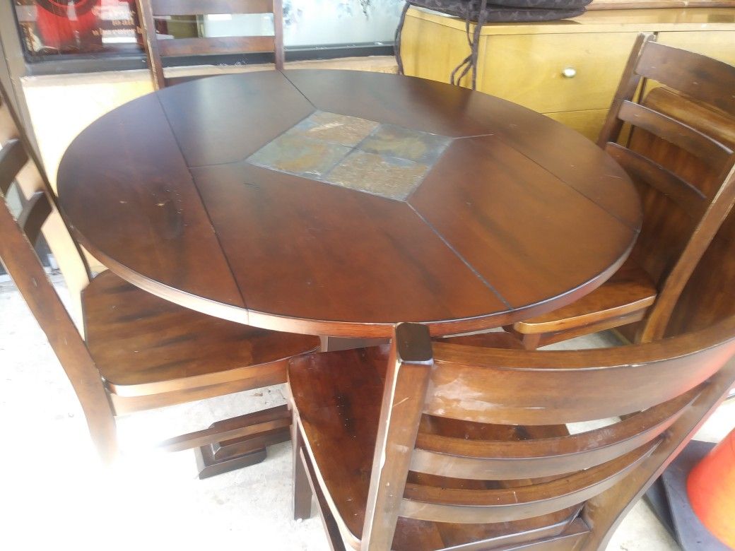 Round Darkwood table and chairs