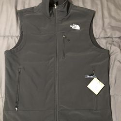 Vest The North face ( Size Large, Médium )