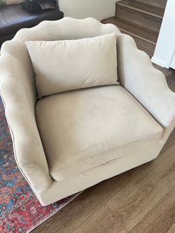 Swivel Cream Velvet Accent Chair with Scalloped Back