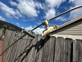 Boat safety rail and marine fishing rod holders