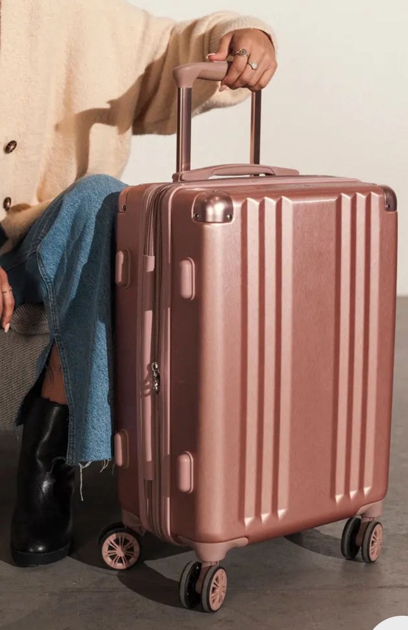Calpak Ambeur Carry On Luggage in Rose Gold