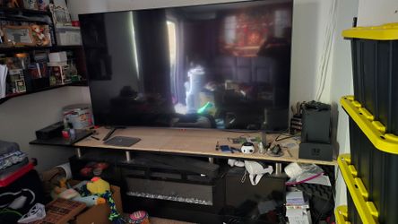 75" LG 4k TV and stand with fireplace