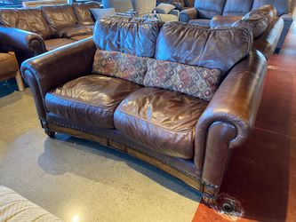 Brown Leather Two Seater Loveseat with Wood Base Frame