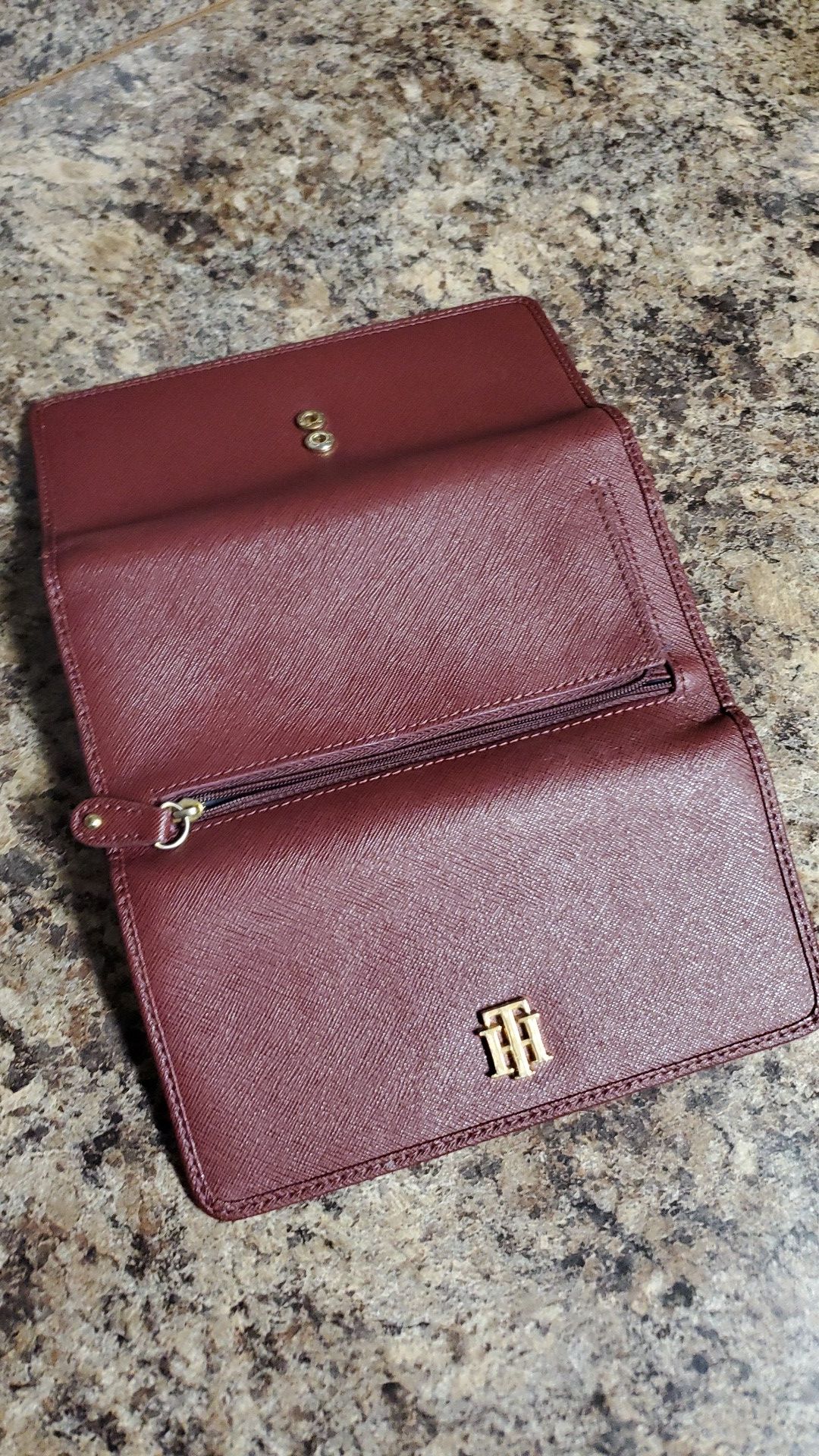 Maroon Tommy Hilfiger wallet.