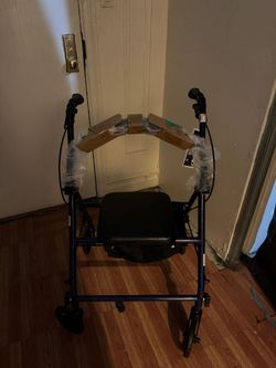 Walking brand new steel rollater with 6iches wheels obo come get this