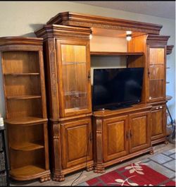 Elegant Wooden Entertainment Center with Corner Units