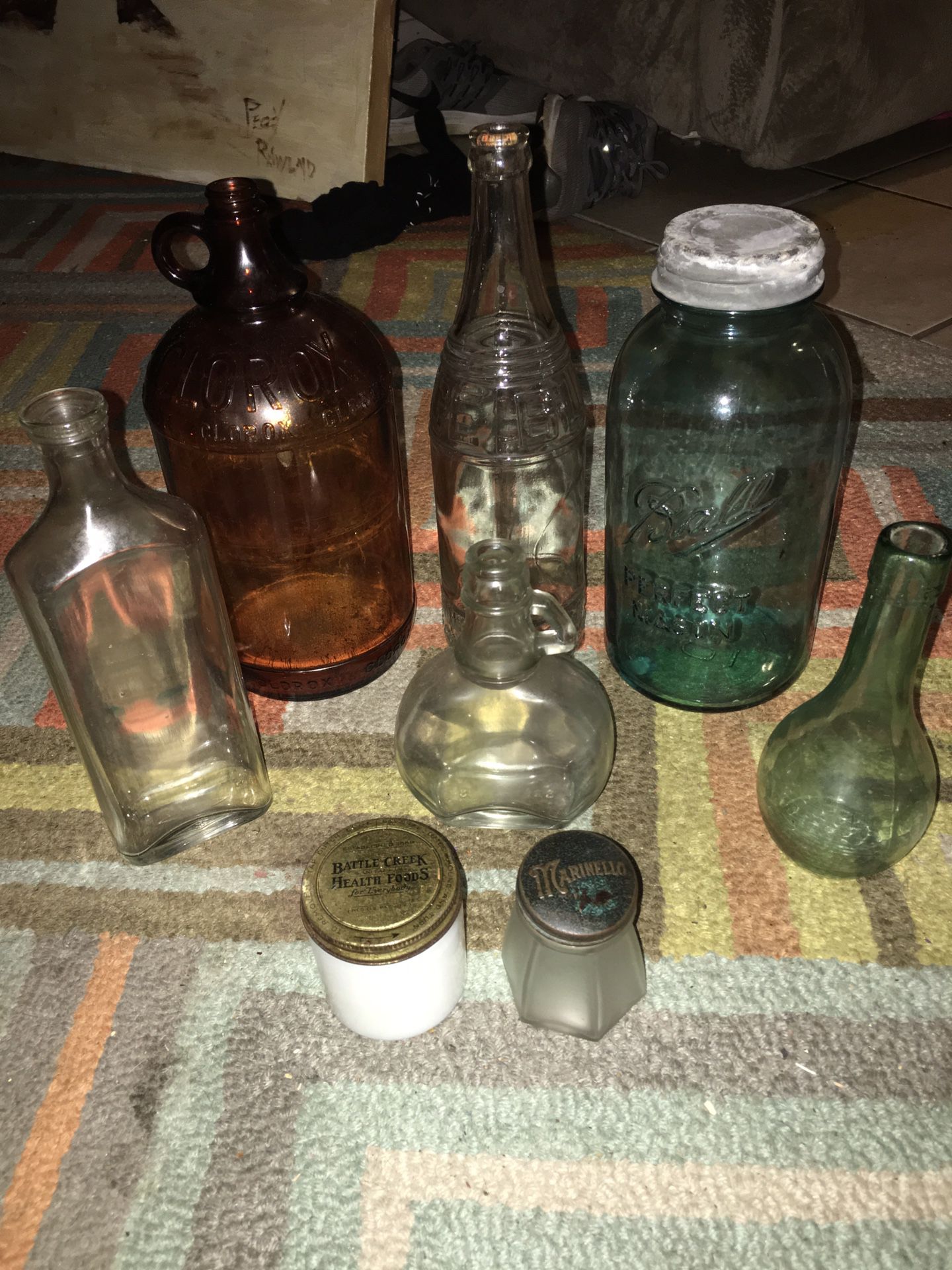 Antique assortment of glassware vintage bottles/jars/shakers