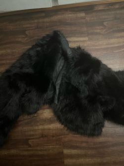 Black fur coat cropped