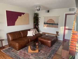 Leather couch + Ottoman