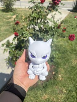 3D-printed figures of the Pokémon Mewtwo