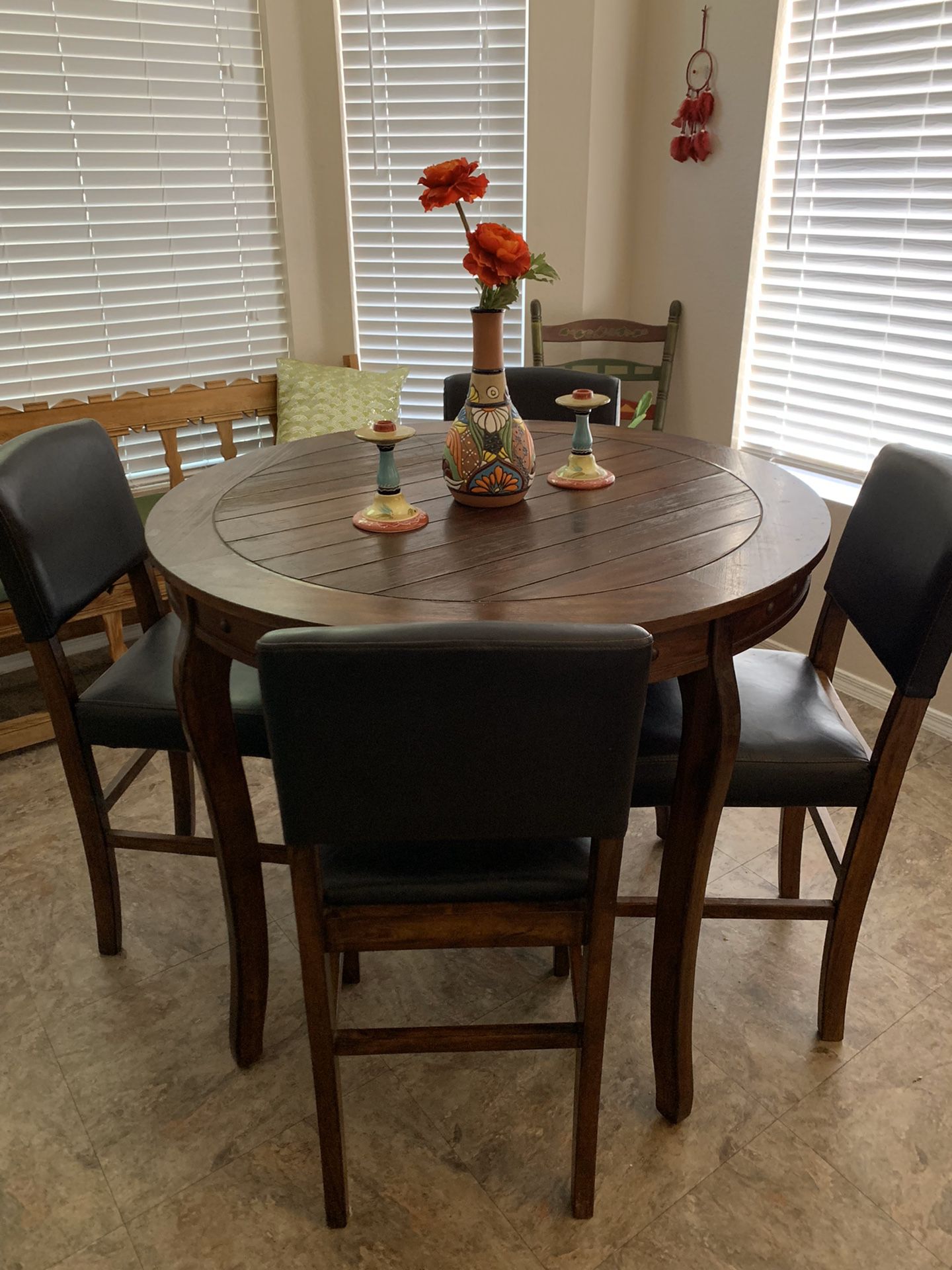Wooden elevated kitchen table and 4 chairs