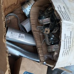Electrical Conduit Pipes and Roll of Romex