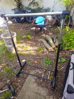Price is firm .. adjustable garment rack