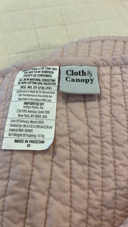 King-size (106 in x 92 in) channel-stitched cotton-blend quilt in a soft blush pink tone