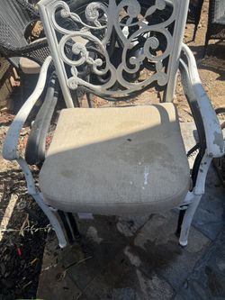 Cast Iron Chairs And Table 