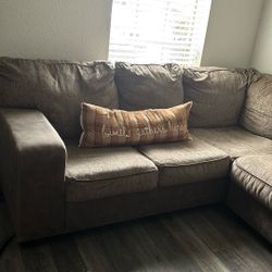 Sectional brown sofa
